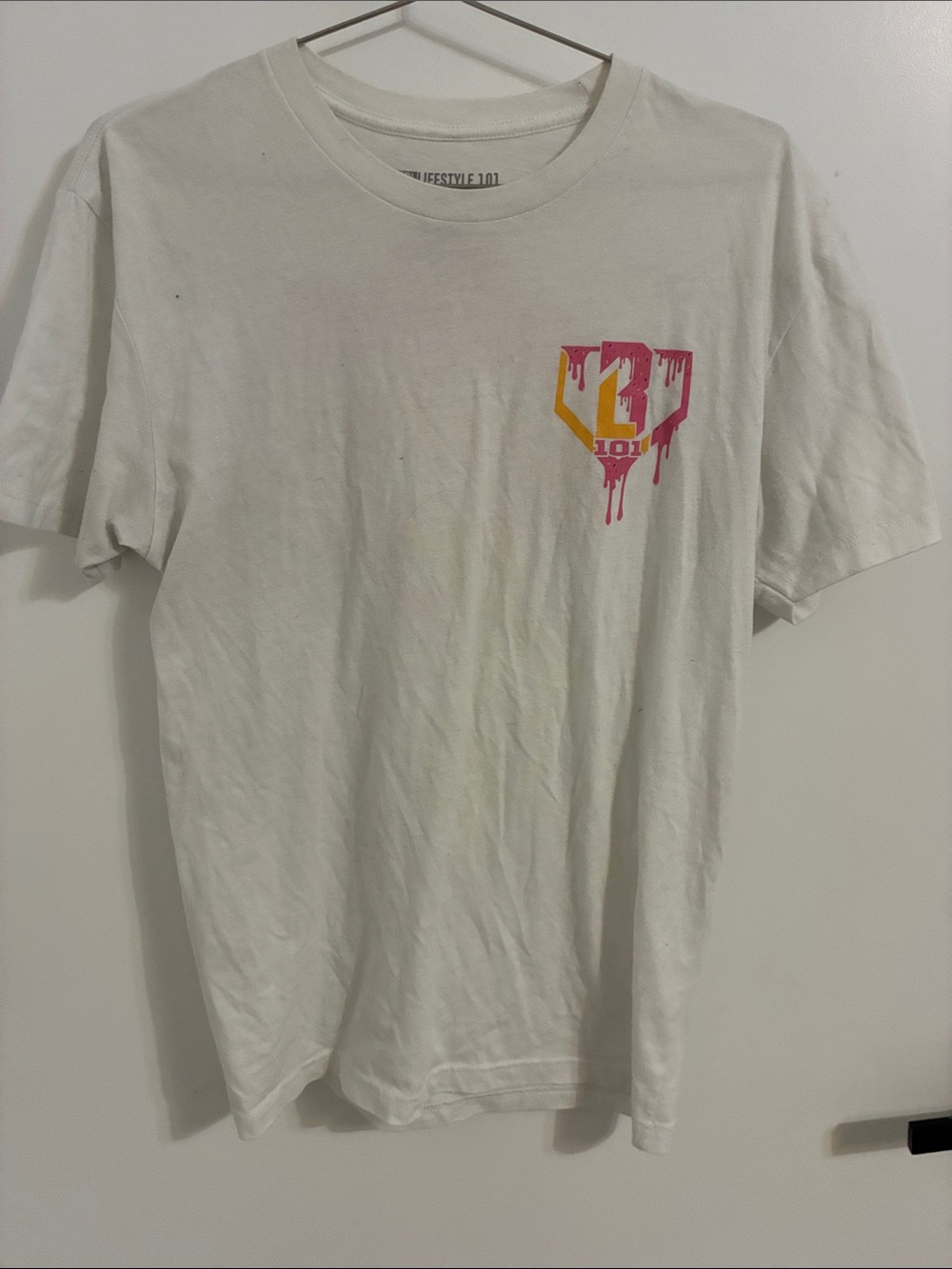 White Short-Sleeve Graphic Tee with Pink and Yellow Drip Logo